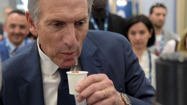 Schultz sips a coffee