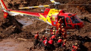 Rescuers search for victims at the site of the disaster - 28 January
